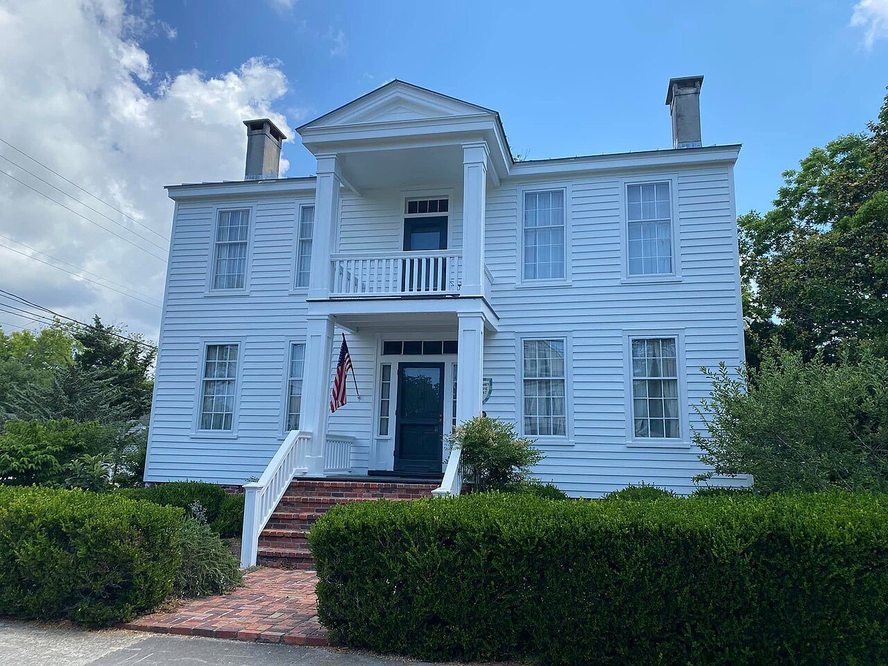 A white two-story house with a double porch in Beaufort.
