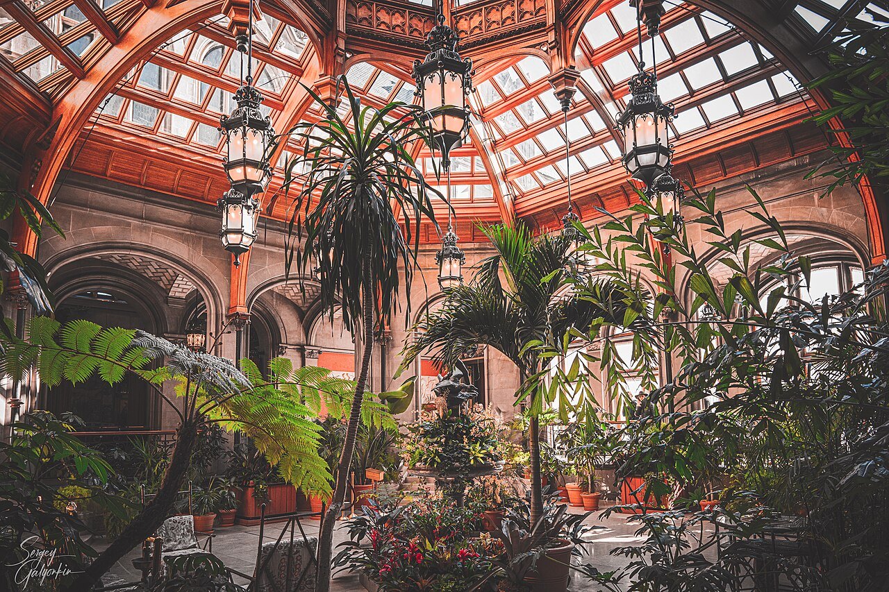 Palms under the glass roof of the winter garden at Biltmore House.
