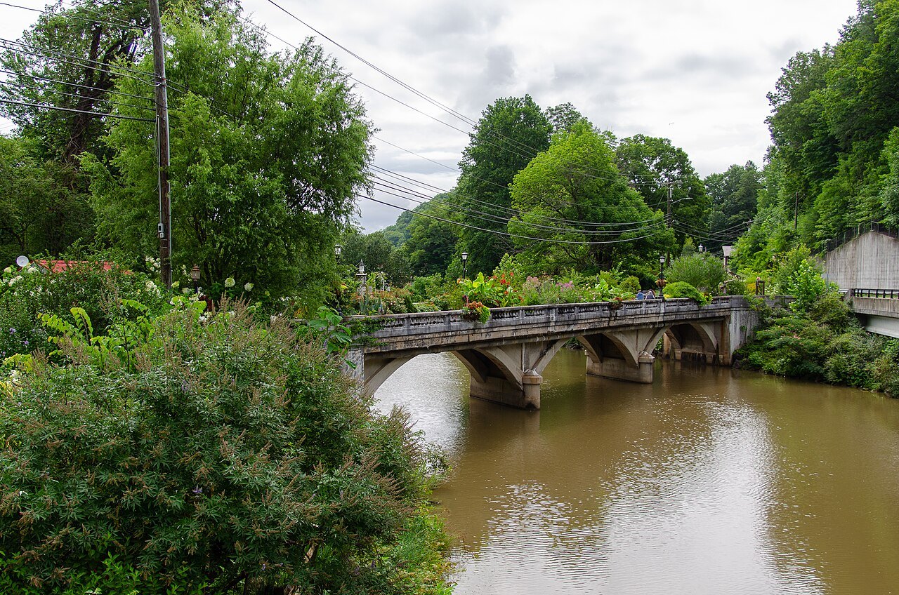 The arched Flowering Bridge over the river at Lake Lure.