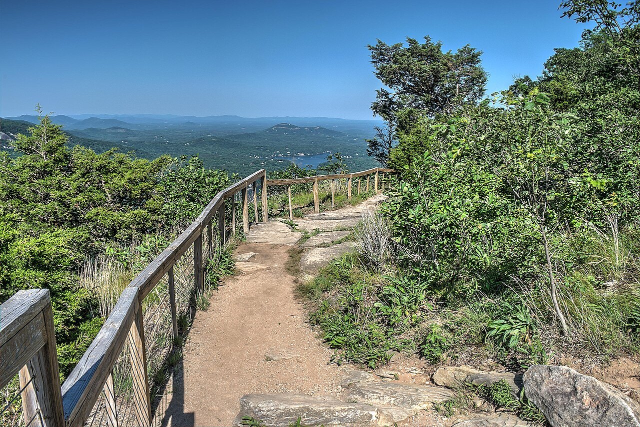 A fenced trail along the cliffs with views over the gorge.
