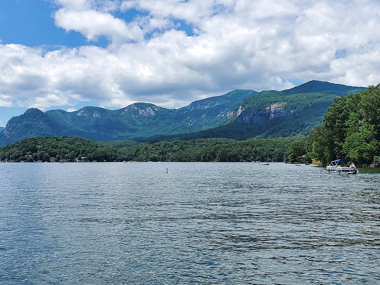 Lake Lure, with the cliffs of Hickory Nut Gorge beyond.