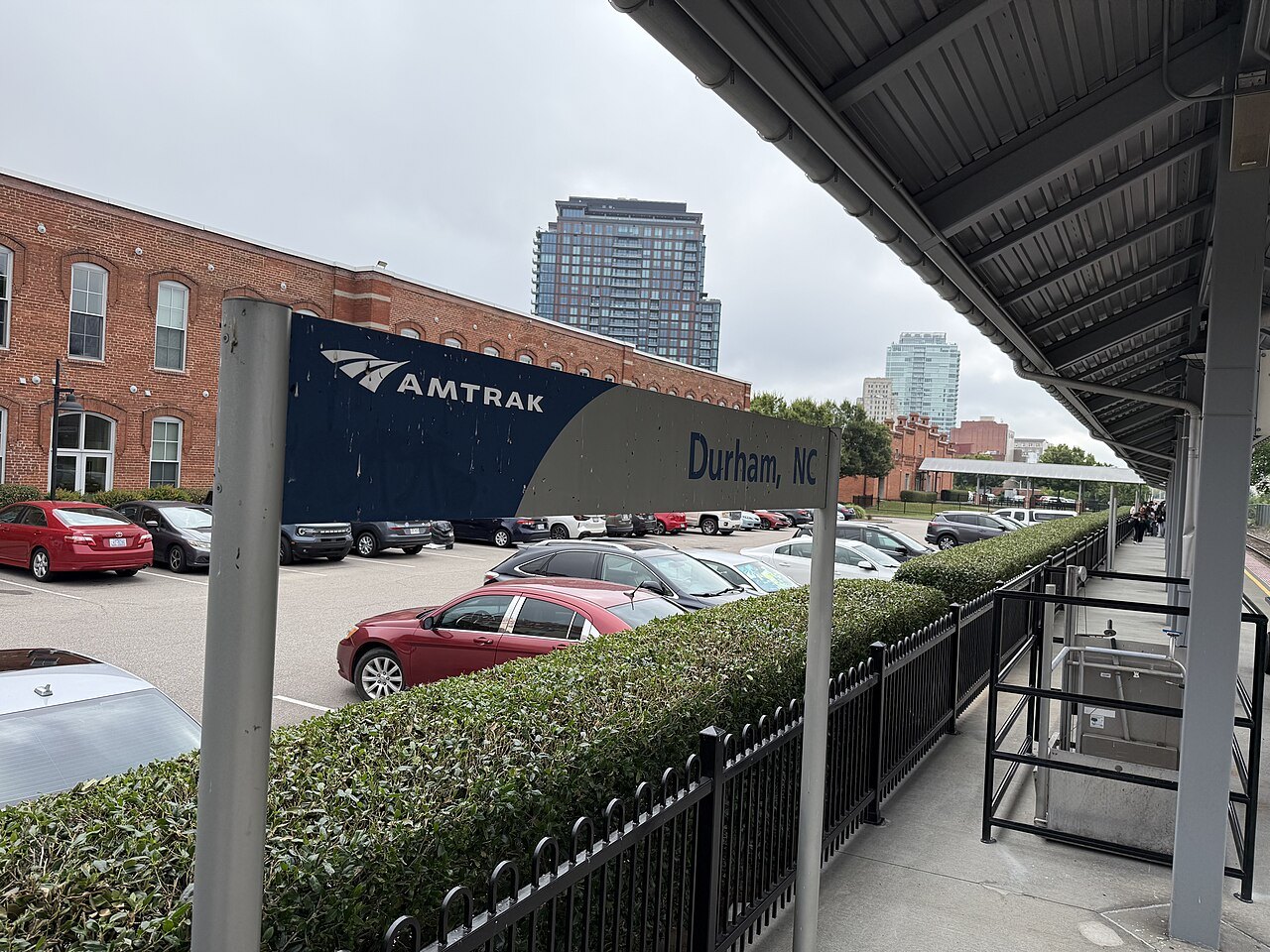 The Amtrak station sign on the platform at Durham.