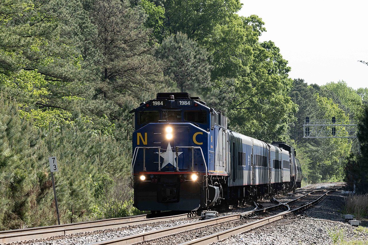 A Piedmont train led by a state-owned locomotive at Cary.