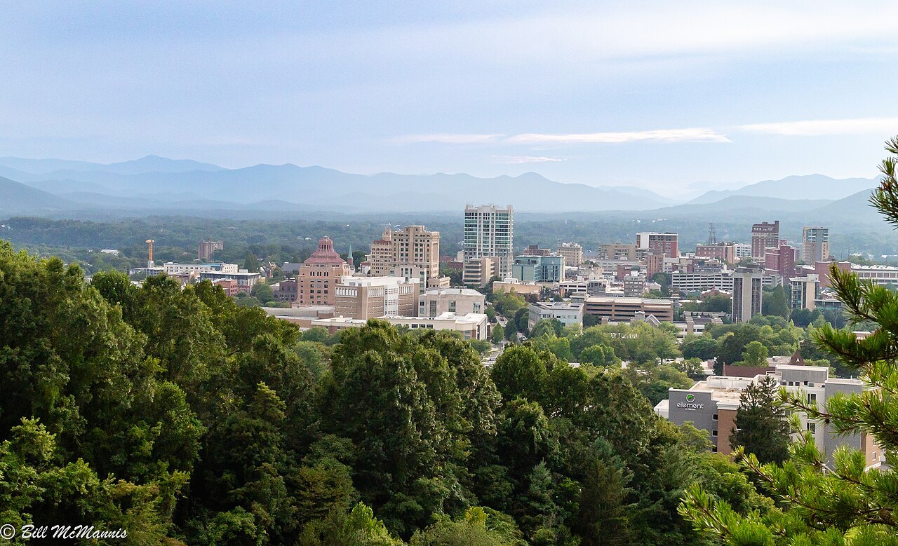 Downtown Asheville's towers against the mountains, seen from Beaucatcher Mountain.