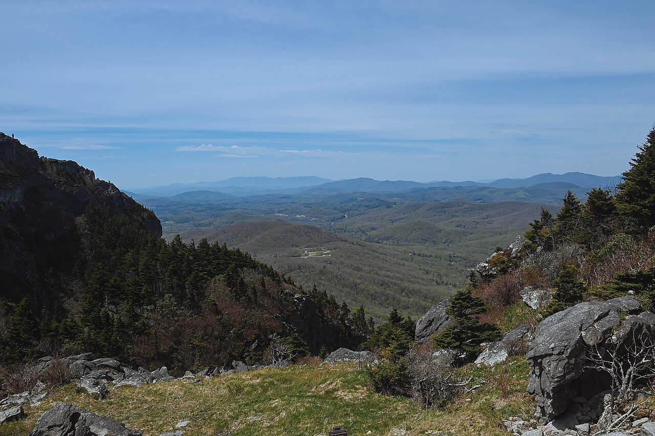 Rocky slopes on Grandfather Mountain falling away to distant ridges.