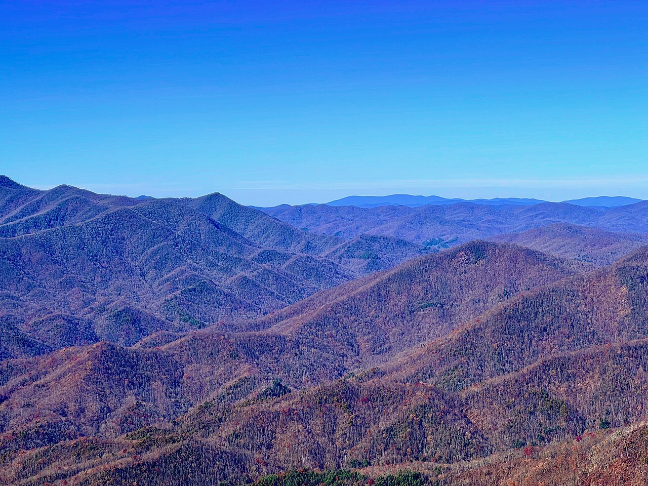Layered blue ranges of the Tusquittee Mountains in Clay County.