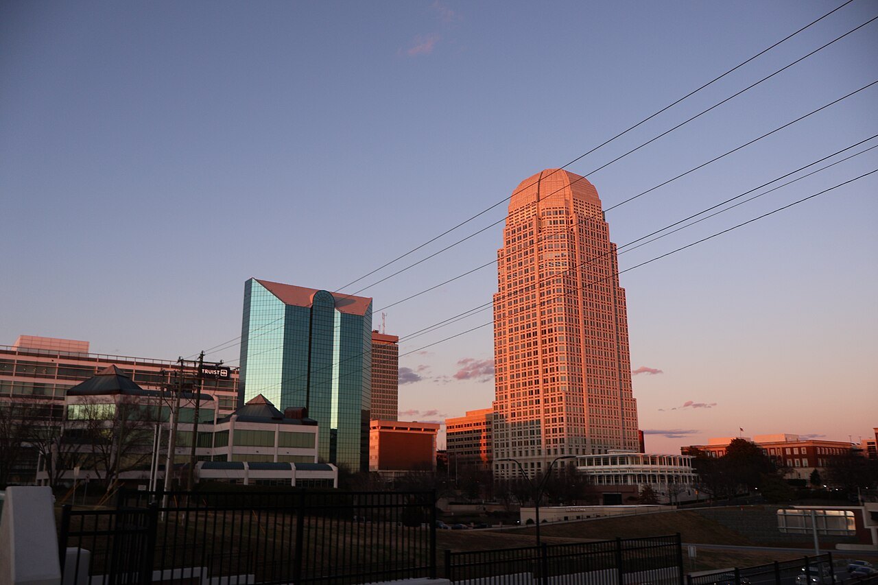 Winston-Salem's towers catching the last light at sunset.