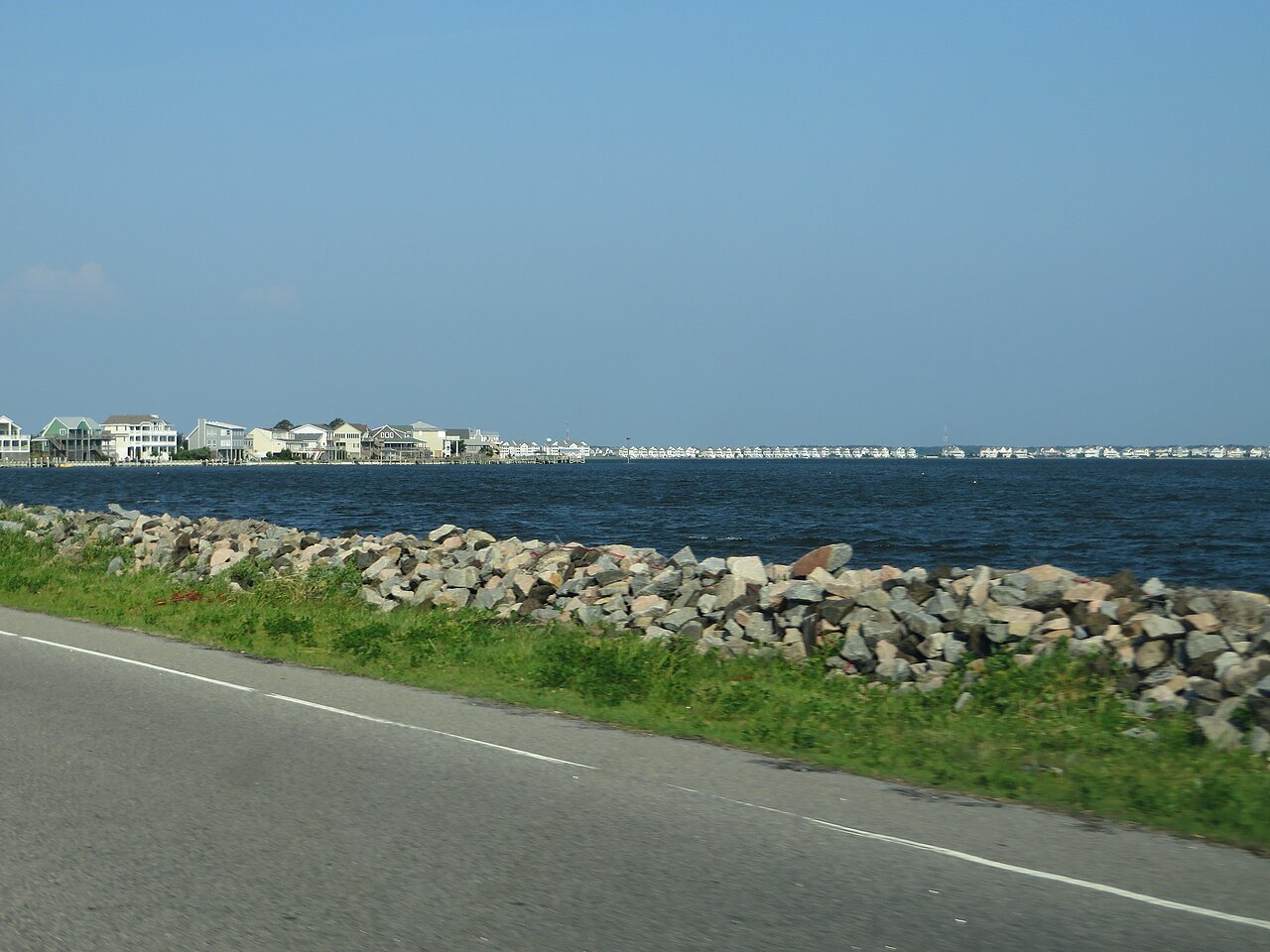 The rocky shore of Roanoke Sound beside US 64 near Nags Head.