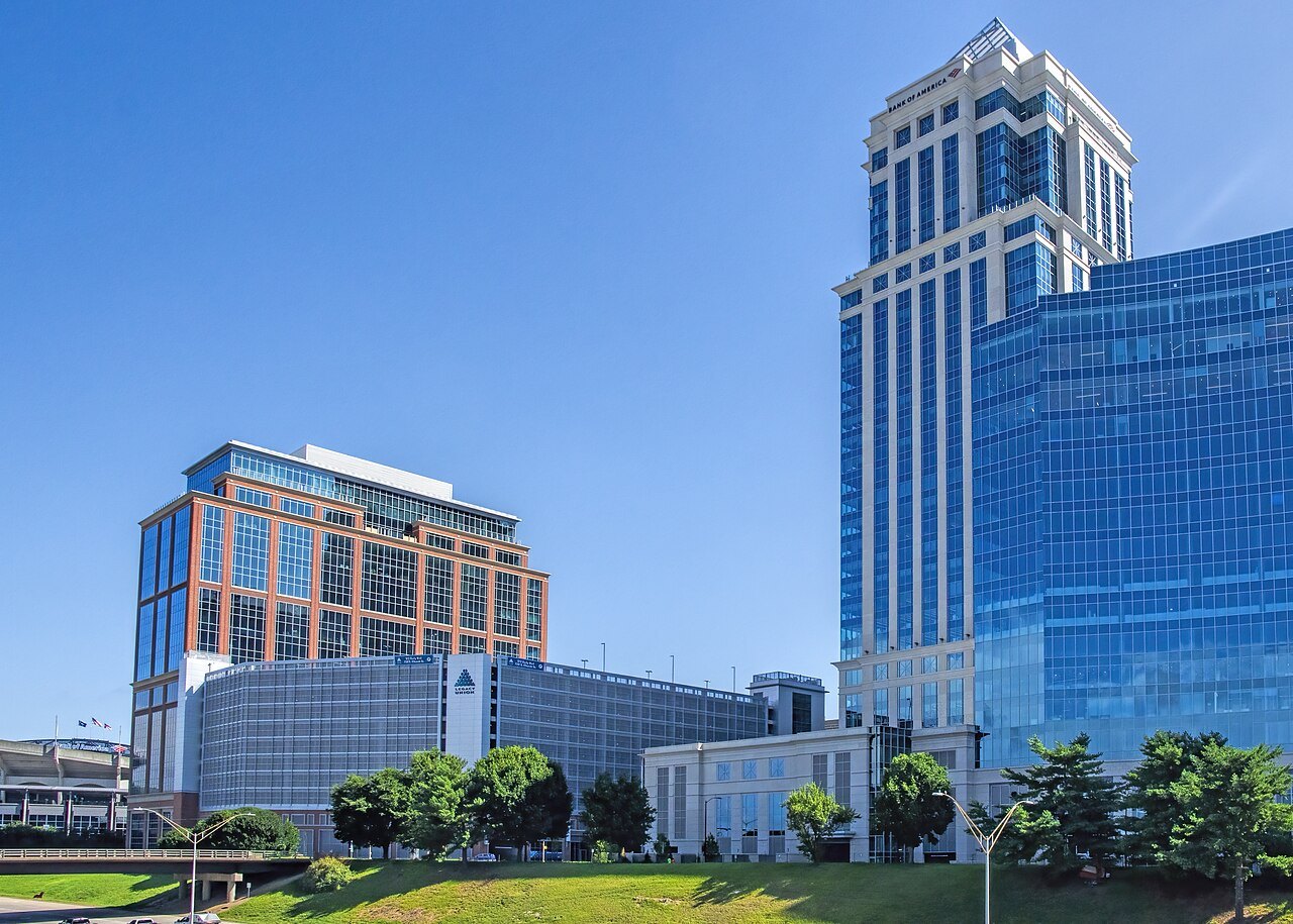 Glass office towers in Charlotte on a bright morning.