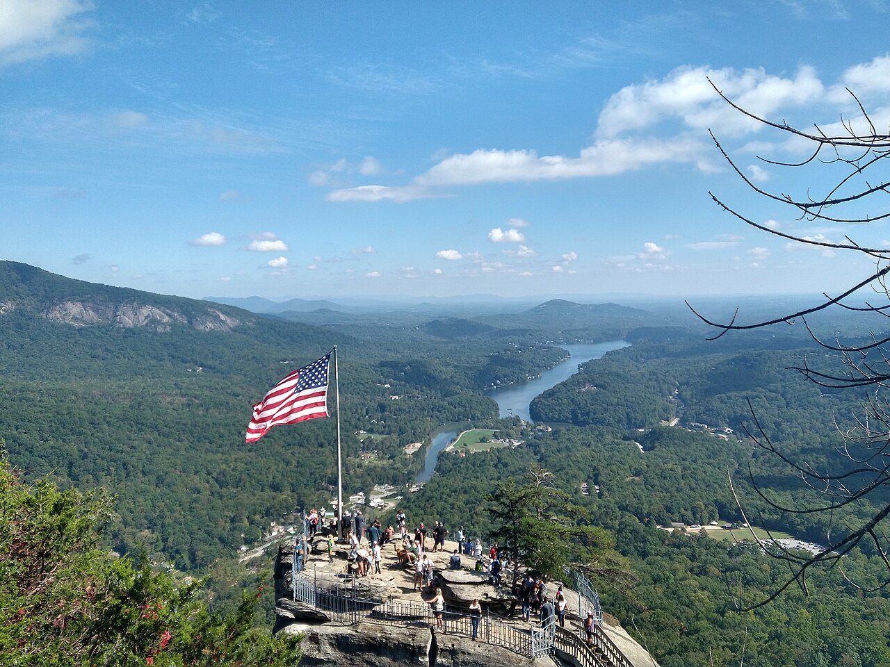 Lake Lure and Hickory Nut Gorge below the flag on Chimney Rock.