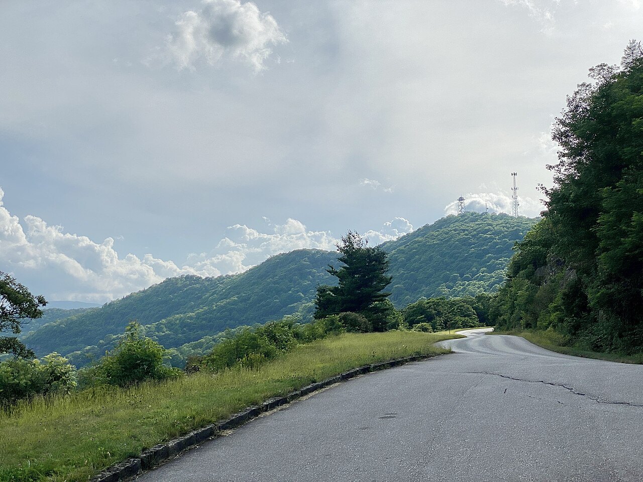 The Parkway curving past the Funnel Top Overlook toward Mount Pisgah.