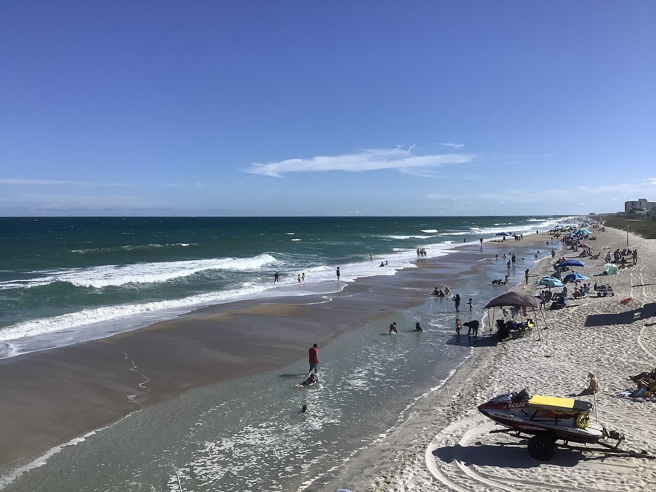 A crowded summer beach at Wrightsville Beach in August.