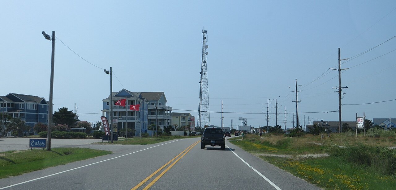 NC 12 passing houses in Waves on Hatteras Island.