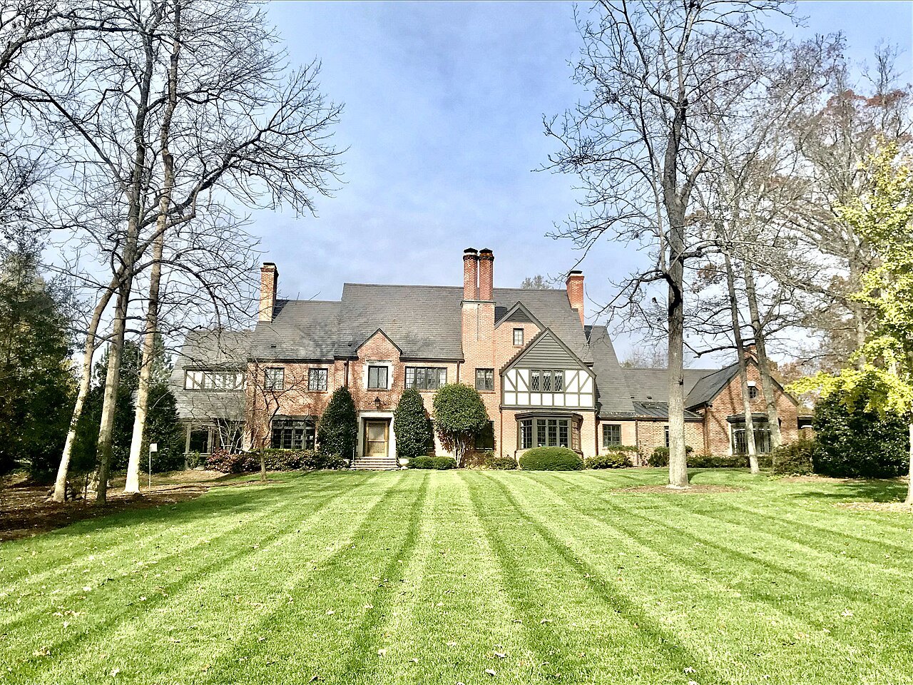 The J. Deryl Hart House behind its striped lawn at Duke.