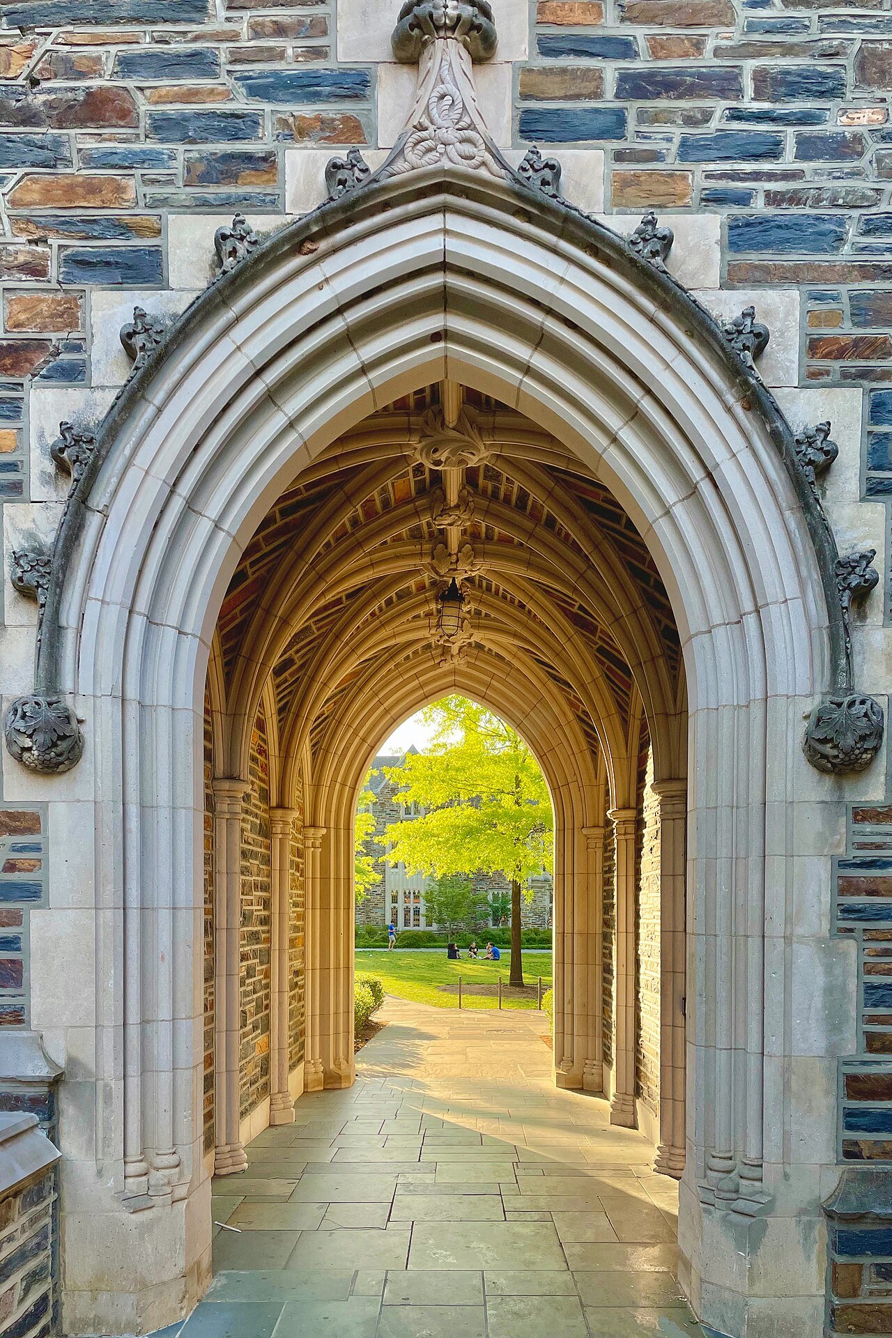Looking through a carved stone archway on Duke's West Campus.
