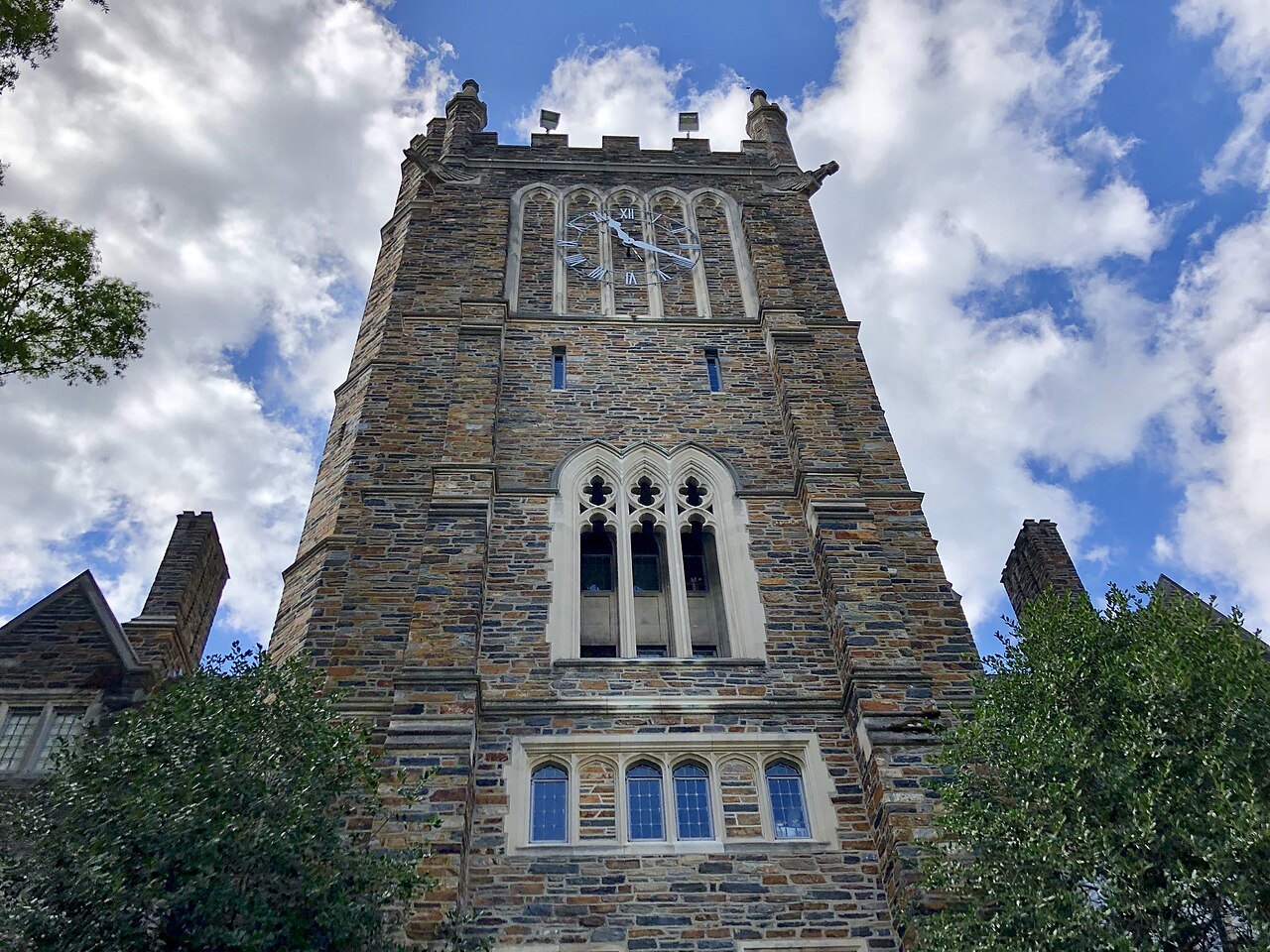 The stone tower of a Gothic building in the McDowell Quad at Duke.