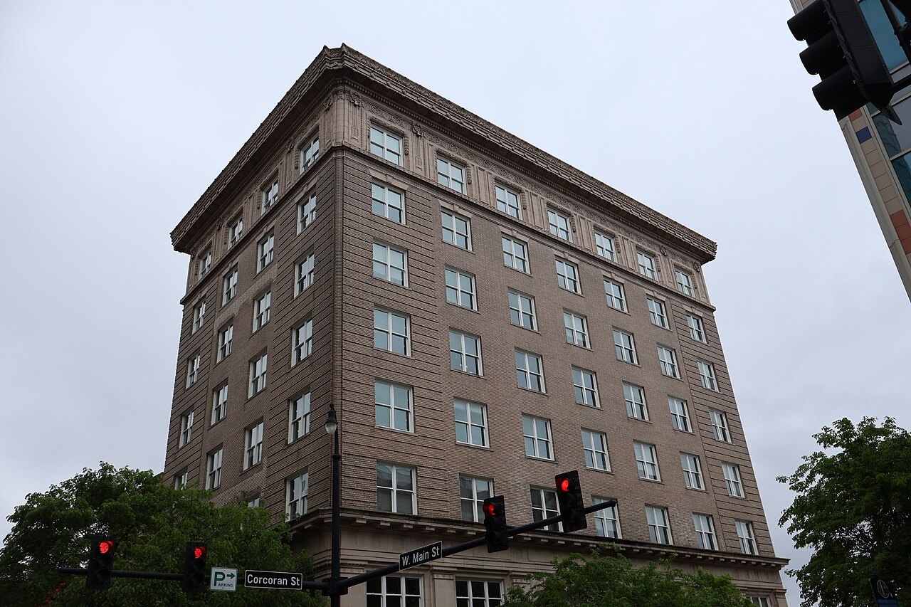 A tall brick office building on West Main Street in Durham.