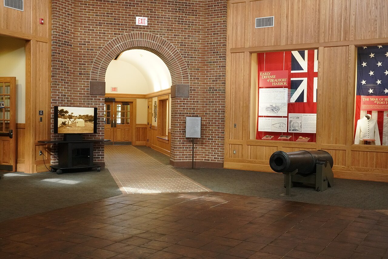 The museum entrance inside Fort Macon, with flags of the period on the walls.