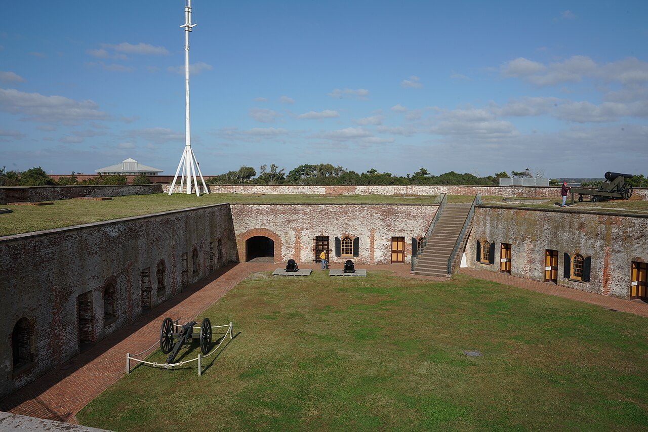 The parade ground inside Fort Macon, ringed by casemate doors.