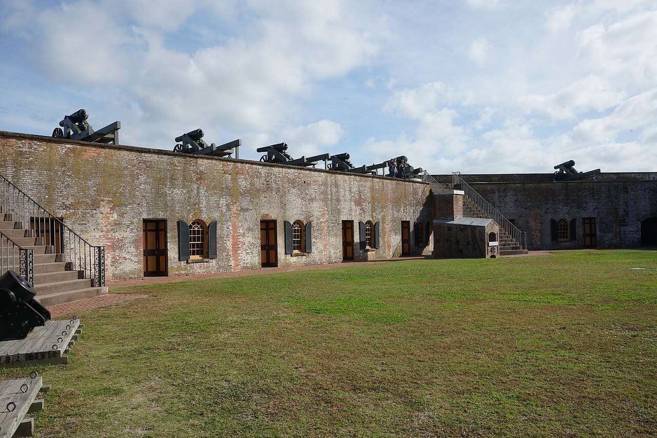 Cannon on the ramparts above the casemates of Fort Macon.