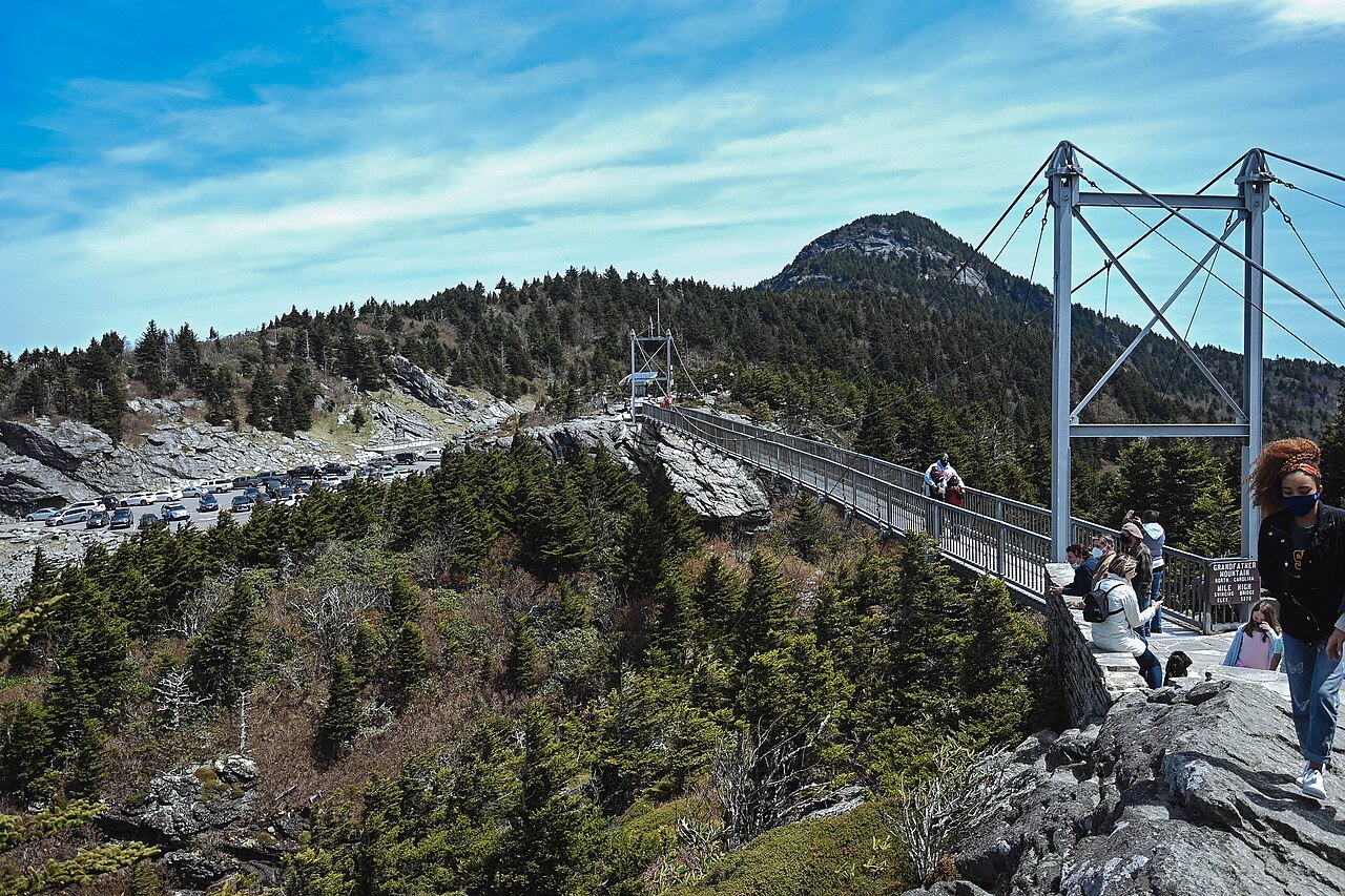 Visitors crossing the Mile High Swinging Bridge on Grandfather Mountain.