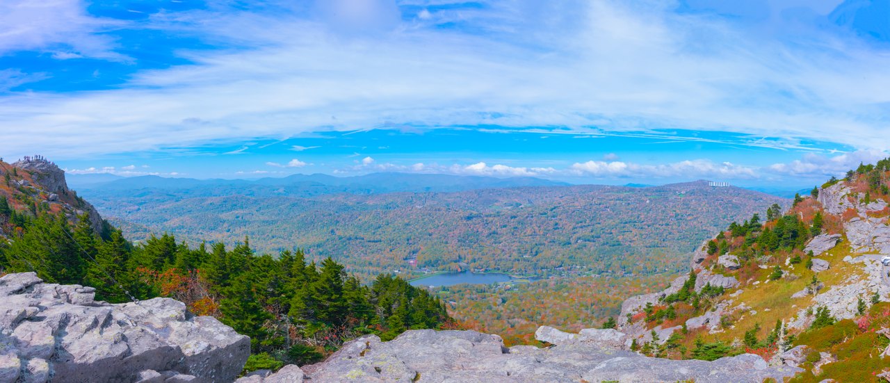 A wide view from the rocks of Grandfather Mountain across the valleys below.