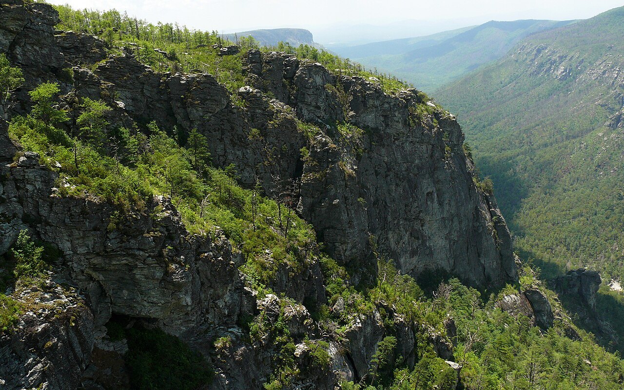 The cliffs of the Linville Gorge falling to the river.