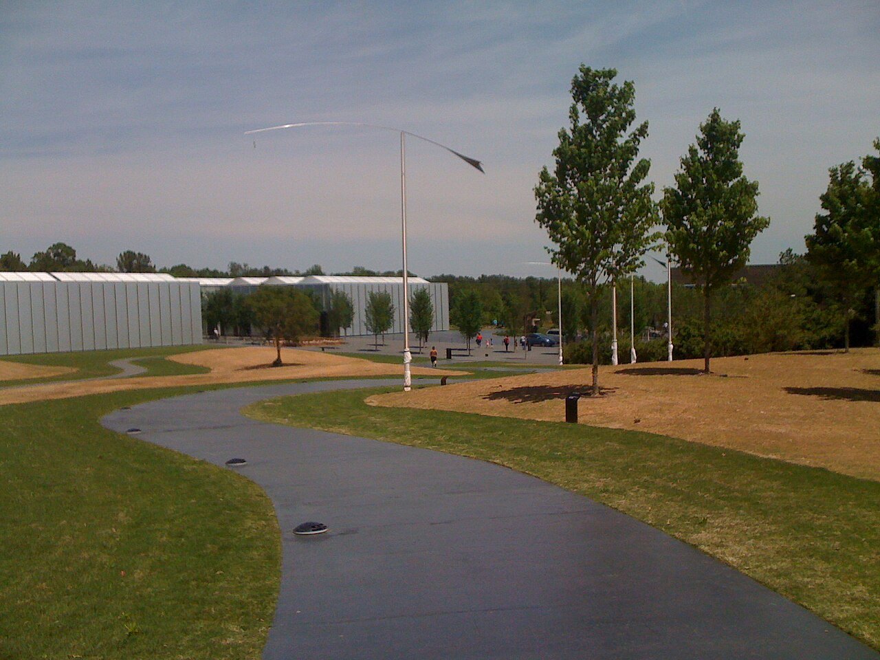 A curving path across the park to the North Carolina Museum of Art.