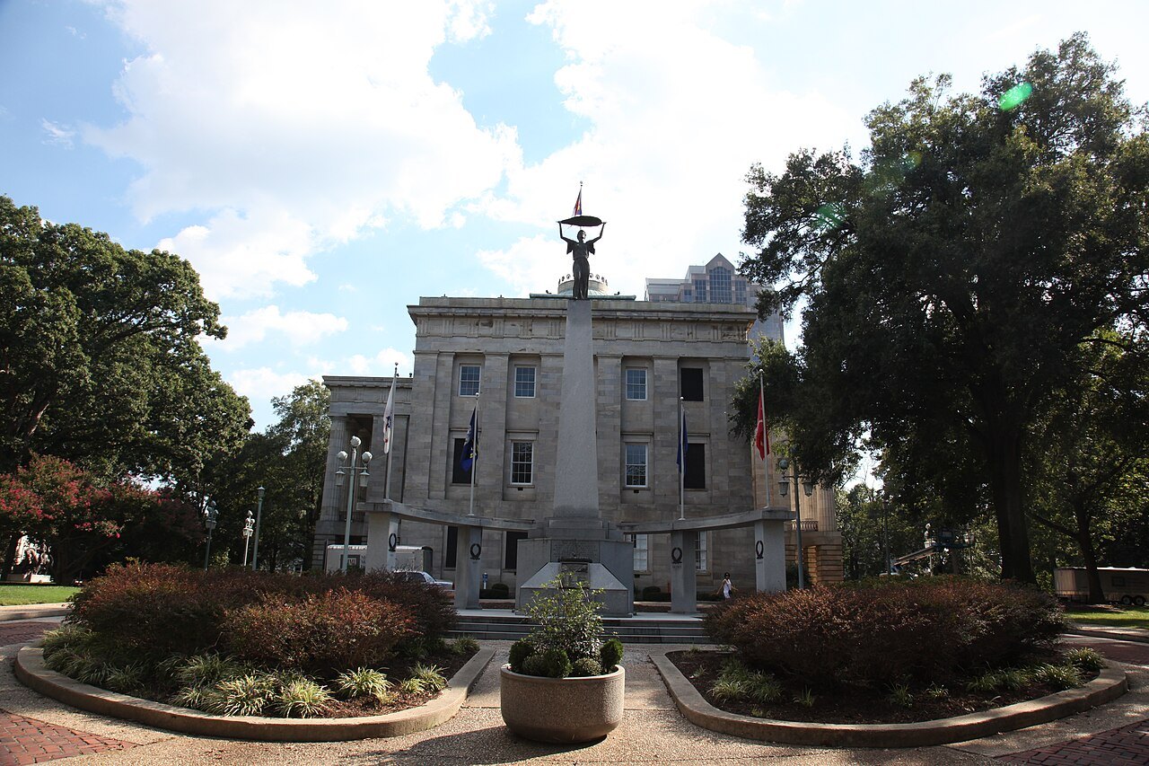 The North Carolina State Capitol seen across the gardens of Union Square.
