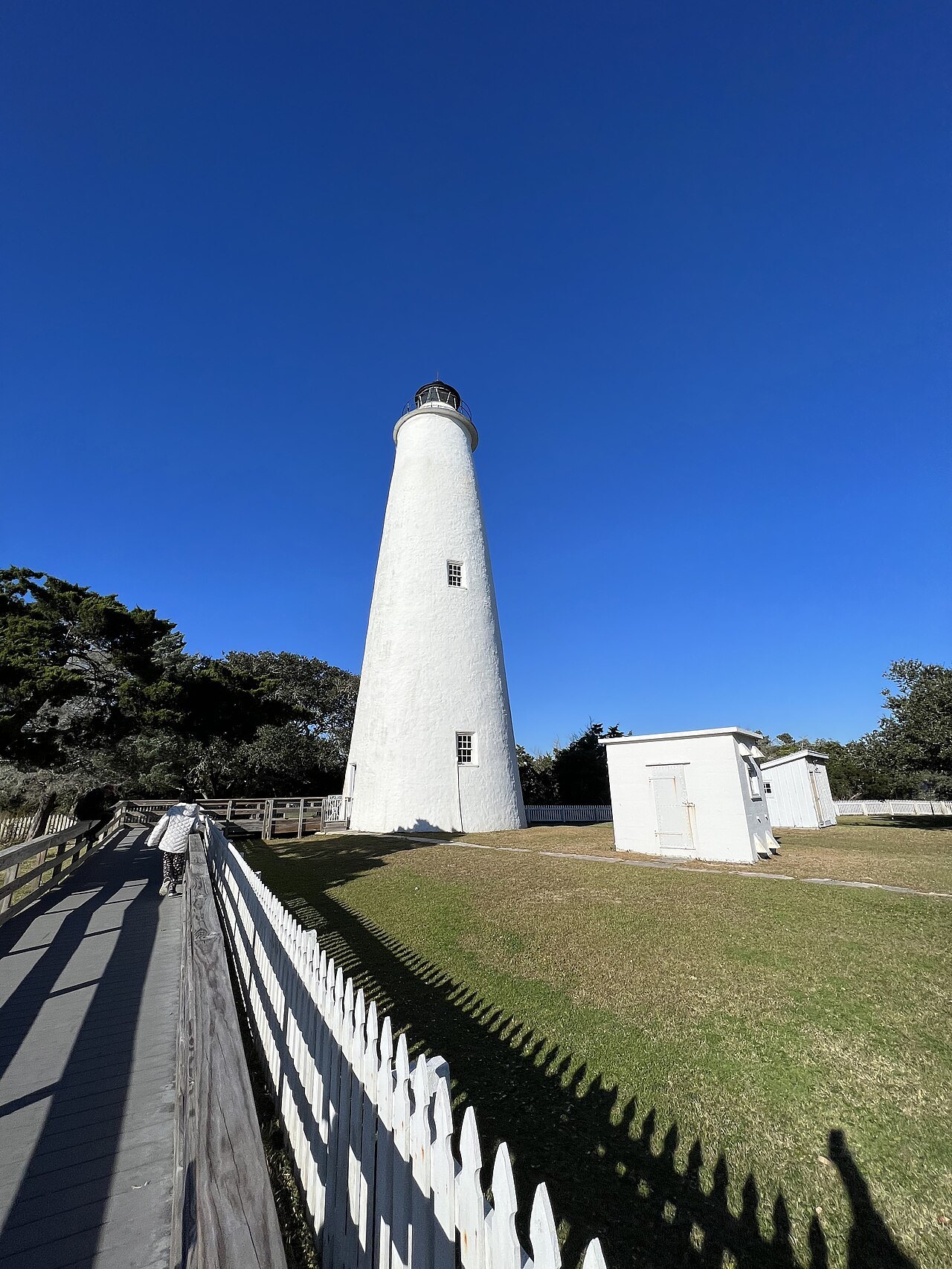 The Ocracoke Light at the end of its boardwalk.