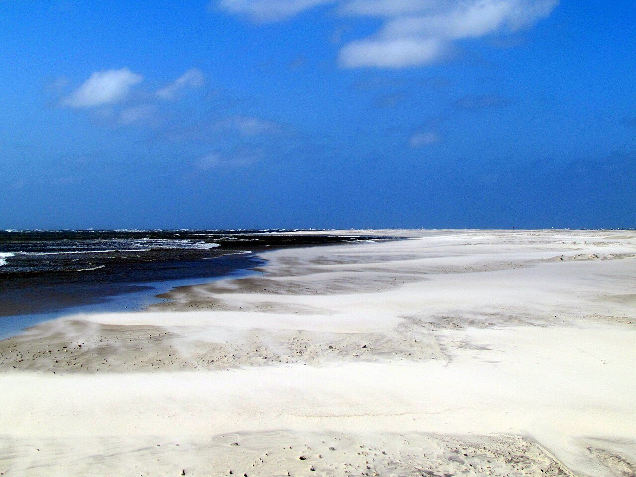 White sand and blue water on the Ocracoke beach.