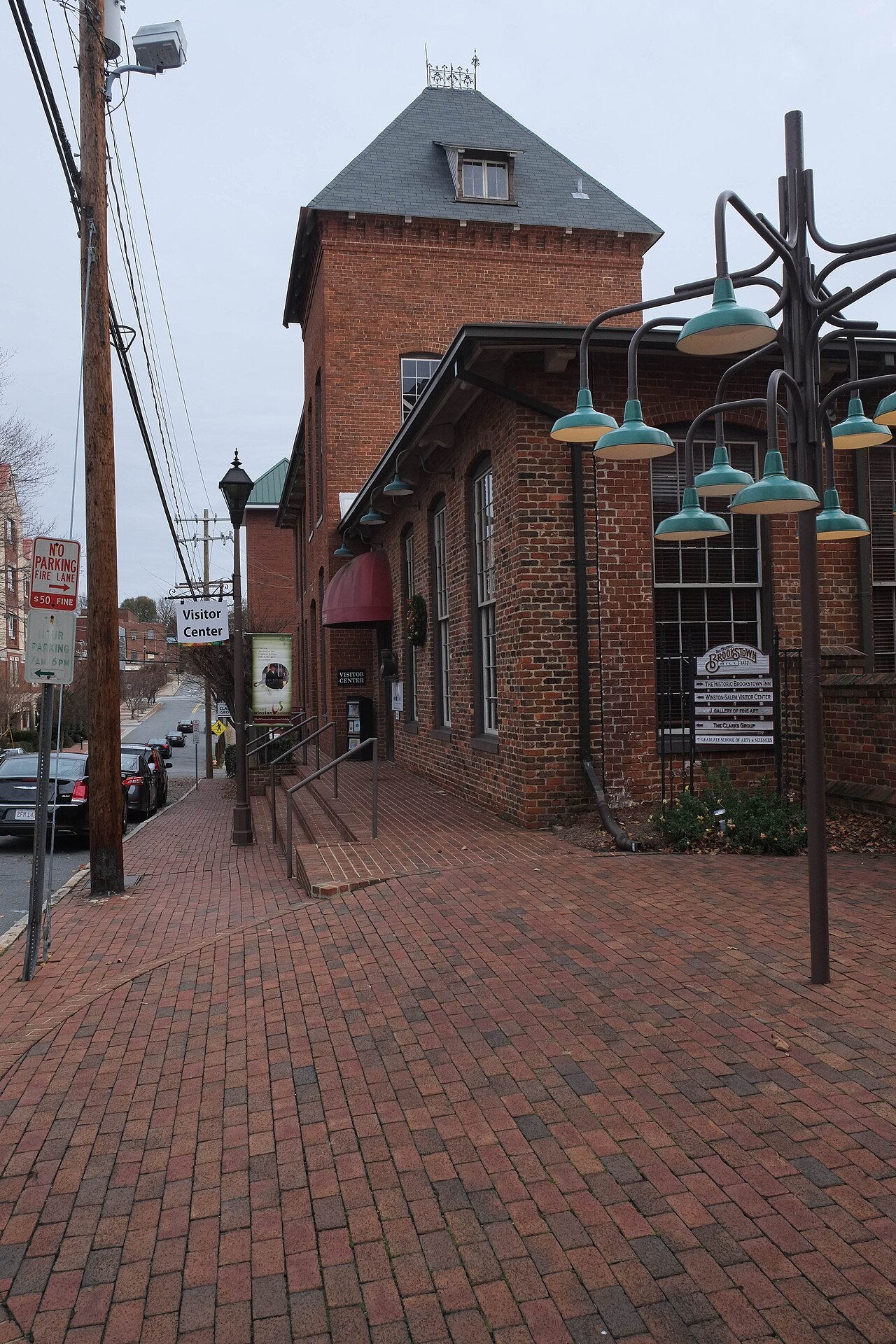 A brick sidewalk by the Old Salem visitor center.