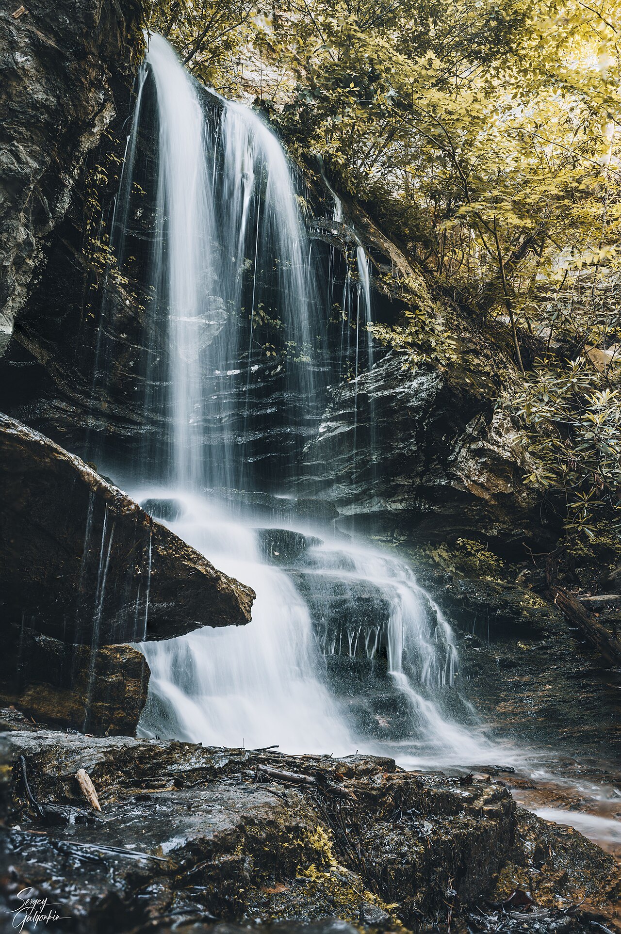Window Falls pouring over a rock ledge at Hanging Rock State Park.