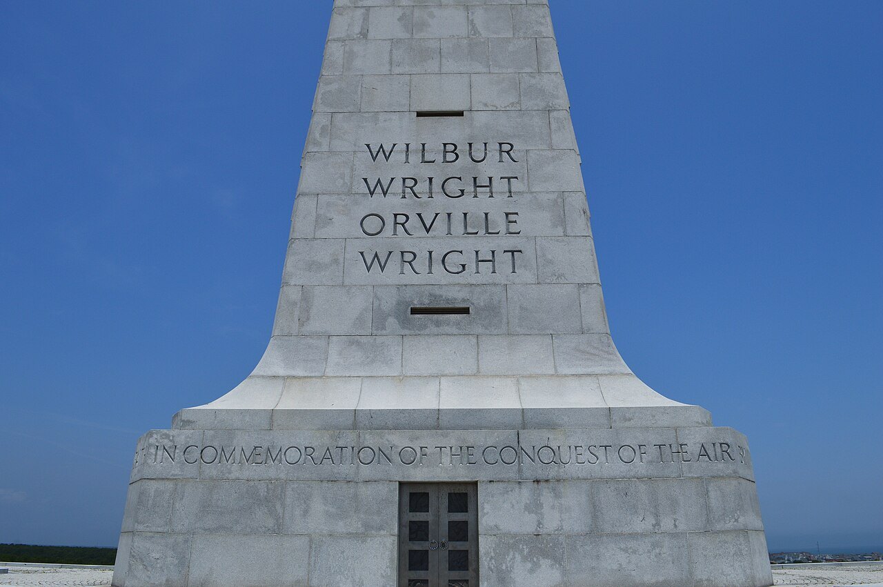 The inscription at the foot of the Wright Brothers Memorial.